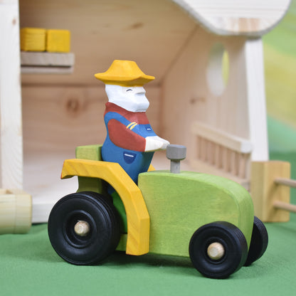 Wooden tractor toy and farmer