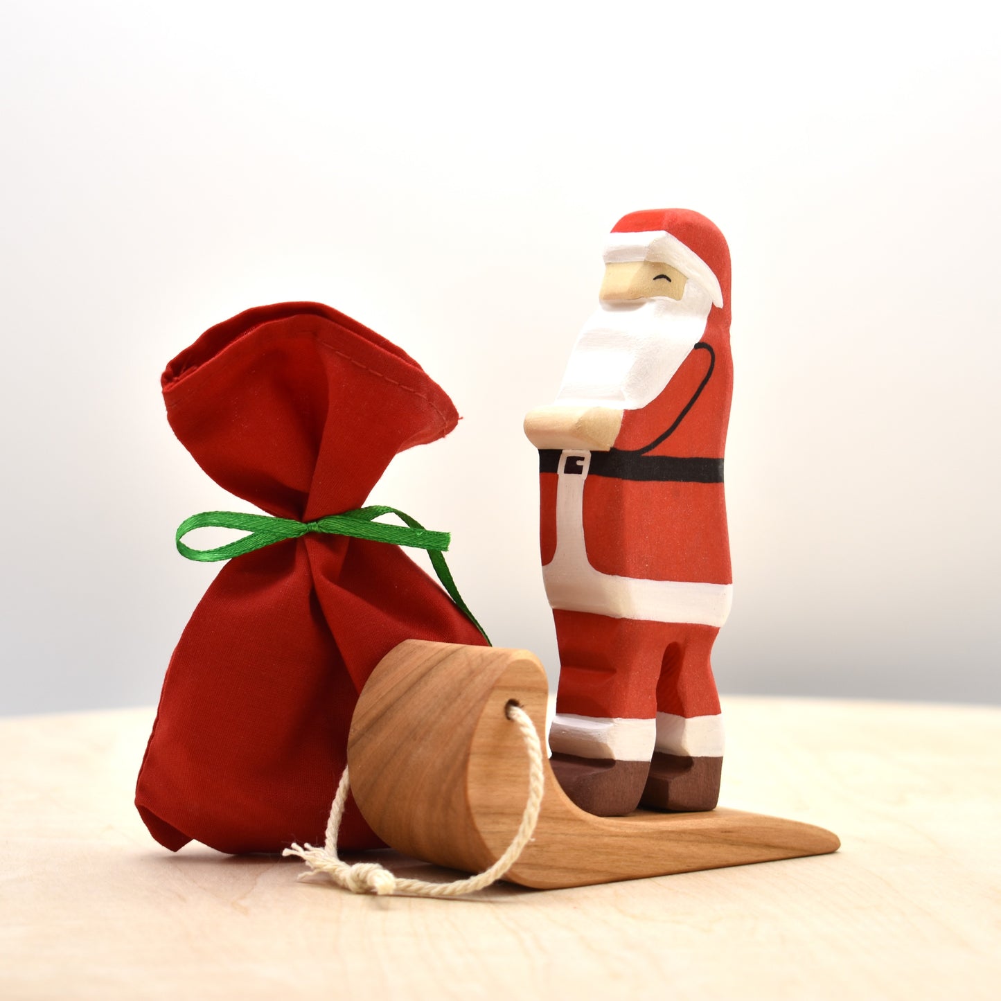 Santa Claus Figurine & Wooden Reindeer Toy