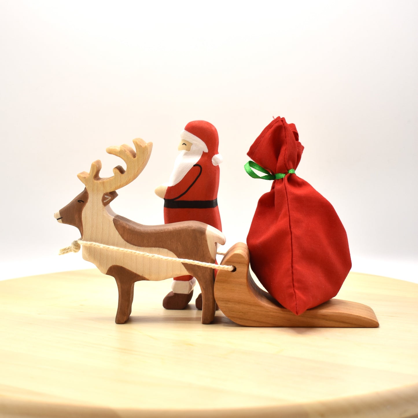 Santa Claus Figurine & Wooden Reindeer Toy